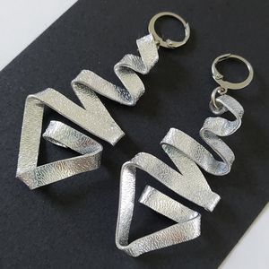 Triangular Handmade one-of-a-kind flat wire-wr…